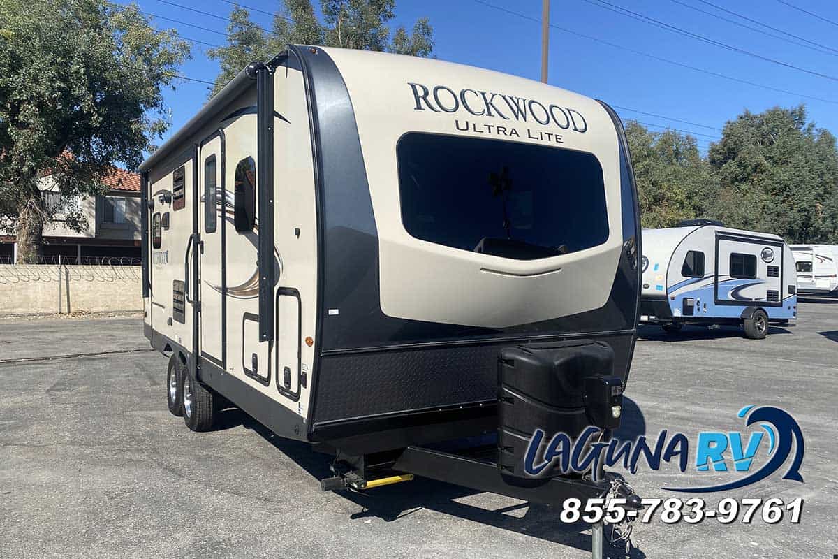 https://lagunarv.b-cdn.net/wp-content/uploads/2023/10/2019-Forest-River-Rockwood-Ultra-Lite-2304DS-Used-Travel-Trailer-RV-For-Sale-T00214-01.jpg